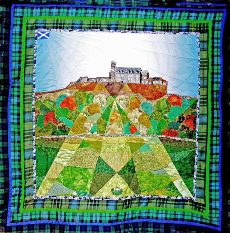 Fractured landscape quilt of Stirling Castle bordered with 3 historical regimental tartans