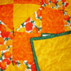 Lap Quilt of yellow and orange chrysanthemum fabrics