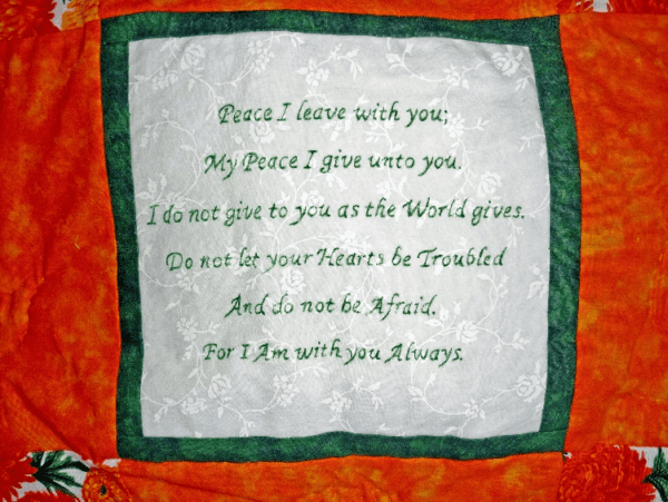 Bible verse John 14:27 inscribed on a quilt