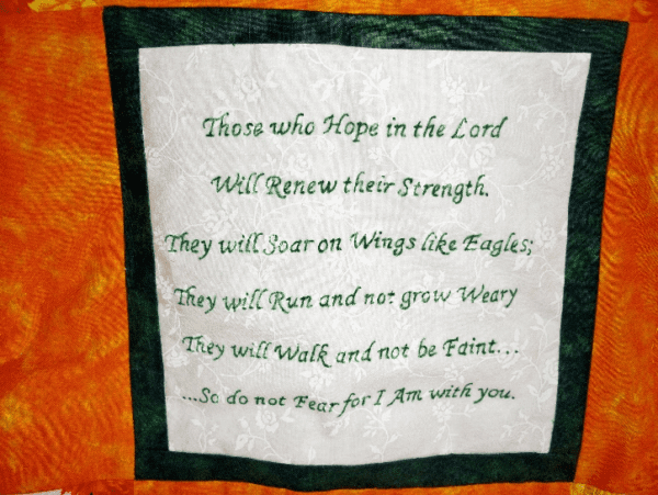 Bible verse Isaiah 30:41 inscribed on a quilt