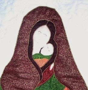 Madonna and Child quilt in fall colours with a heart design