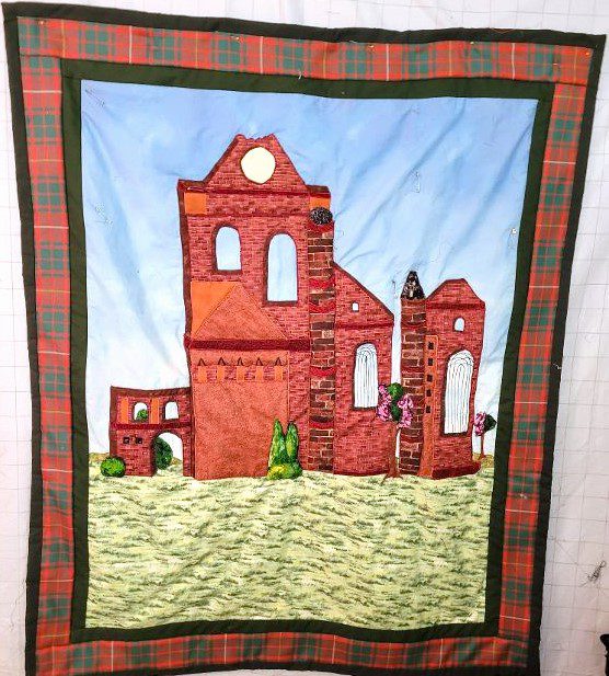 Quilt of Arbroath Abbey framed with the Bruce tartan