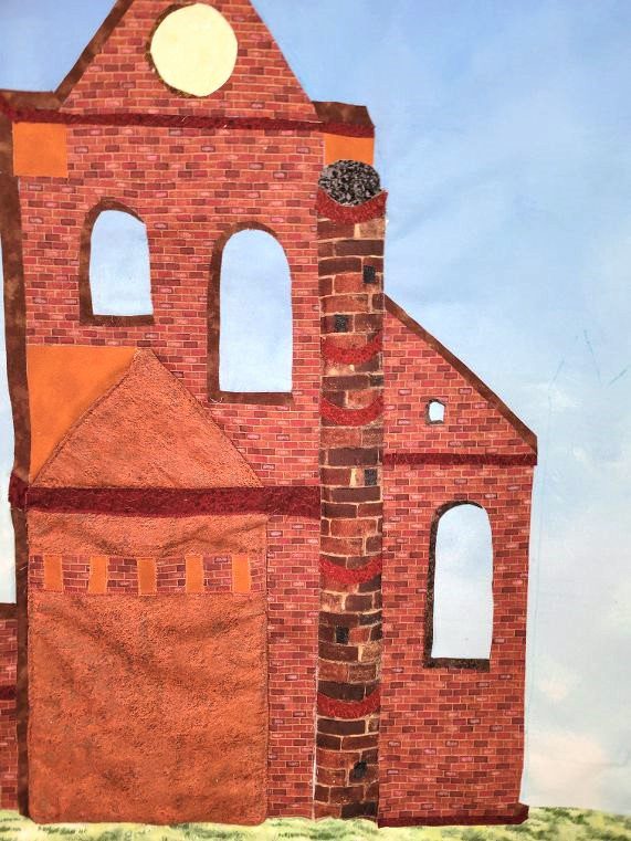 Quilting Arbroath Abbey with fabric pieces