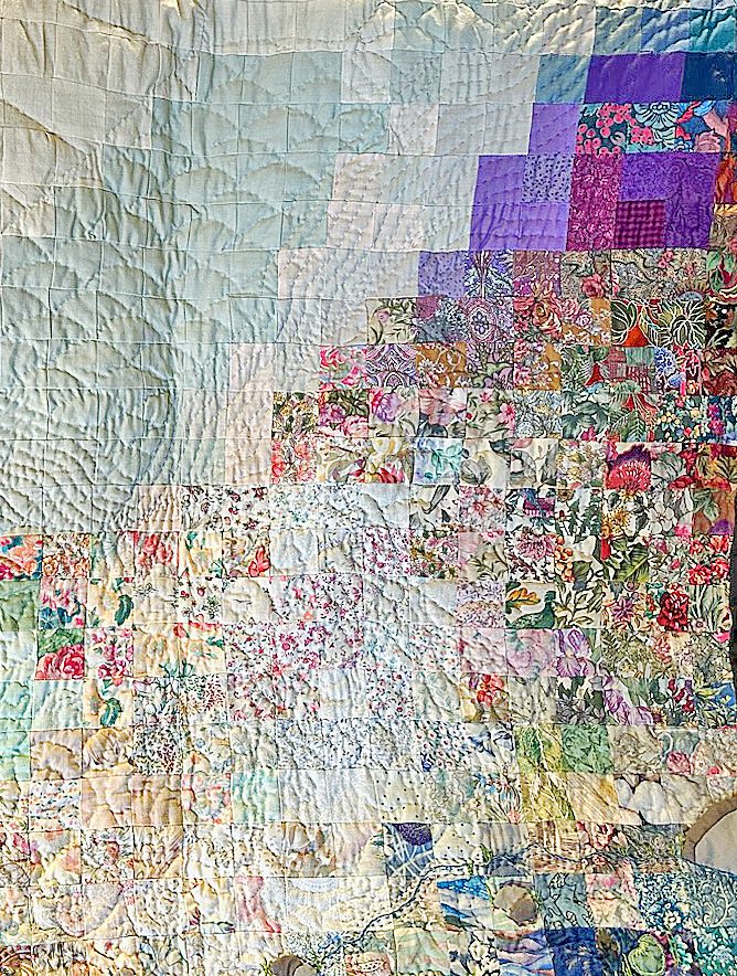 Quilt with many different coloured squares