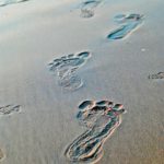 Footprints on a sandy beach