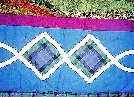 Quilt border of Celtic knot with tartan design