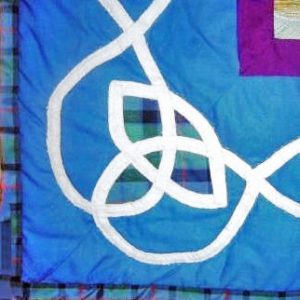 Quilted Trinity knot design with Flower of Scotland tartan