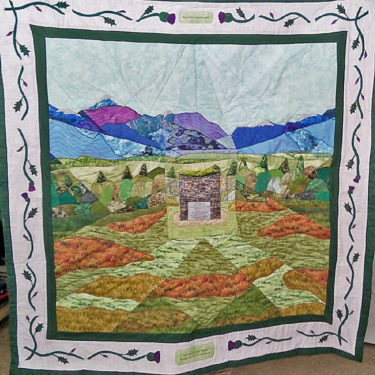 A quilt of the Memorial Cairn at the battlefield of Culloden and the surrounding moorland