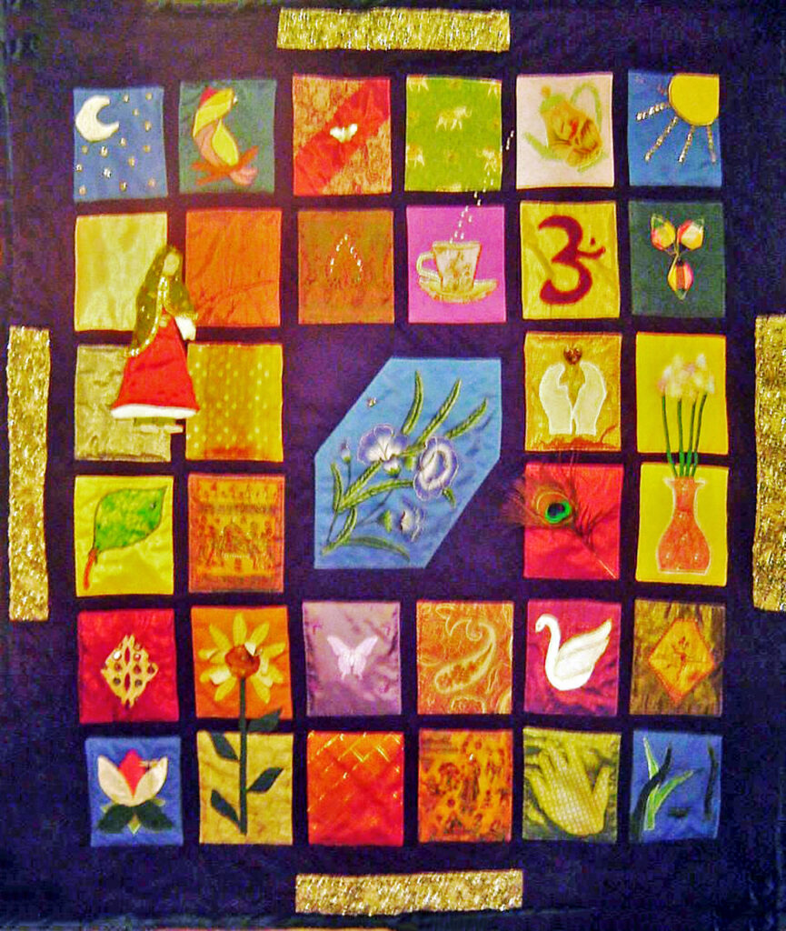 A tapestry-like quilt depicting the spirit of India