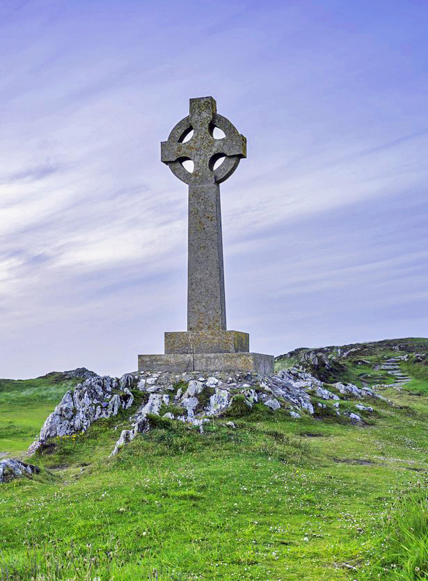 Celtic cross upon a lonely hilltop