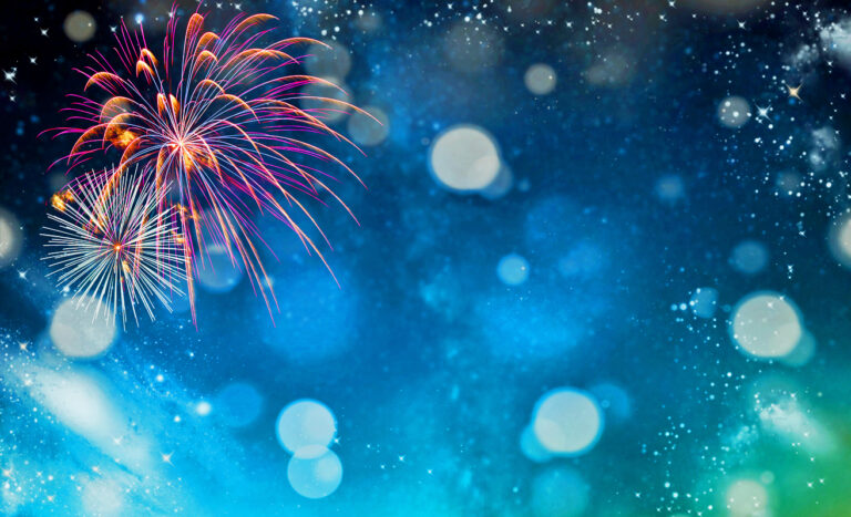 Fireworks at New Year and copy space - abstract holiday background