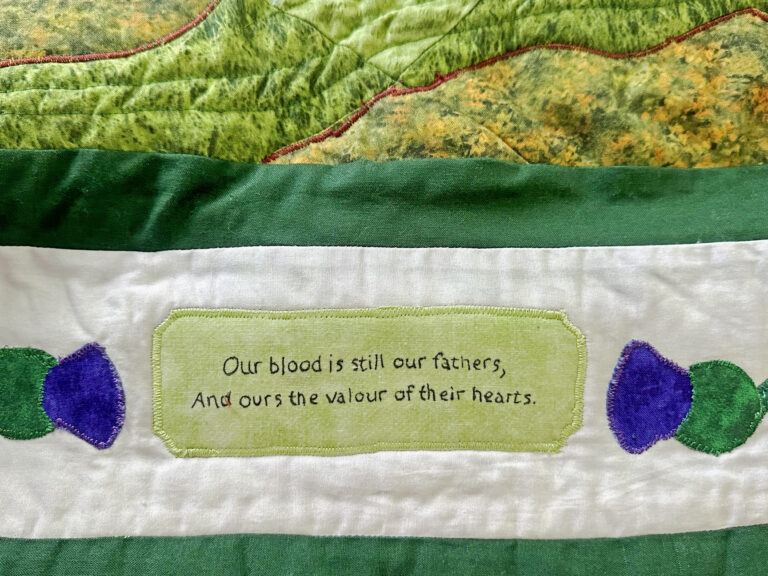 Culloden quilt border design with the motto found on the battlefield