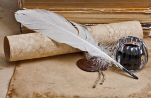 Old parchment and quill pen.