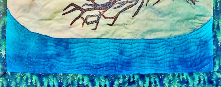Waves stitched into fabric to make it look like an ocean