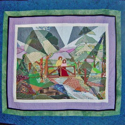 Fractured landscape quilt of a couple on a bridge surrounded by forest trees and stream using a wide array of fabric and multi-coloured threads