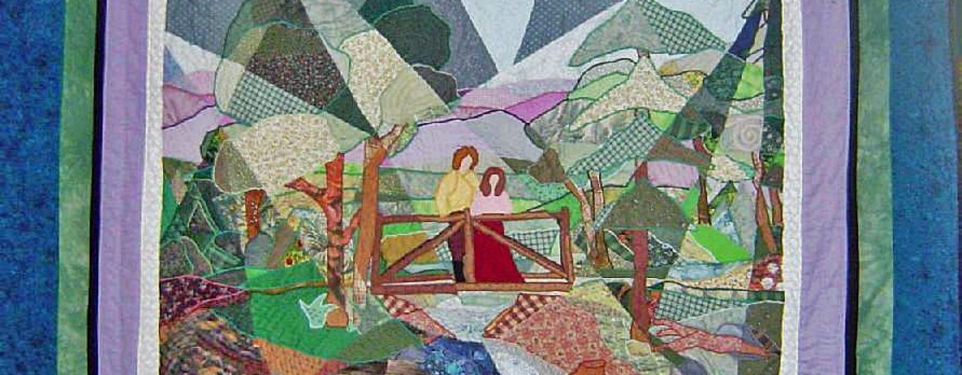 Fractured landscape quilt of a couple on a bridge surrounded by forest trees and stream using a wide array of fabric and multi-coloured threads