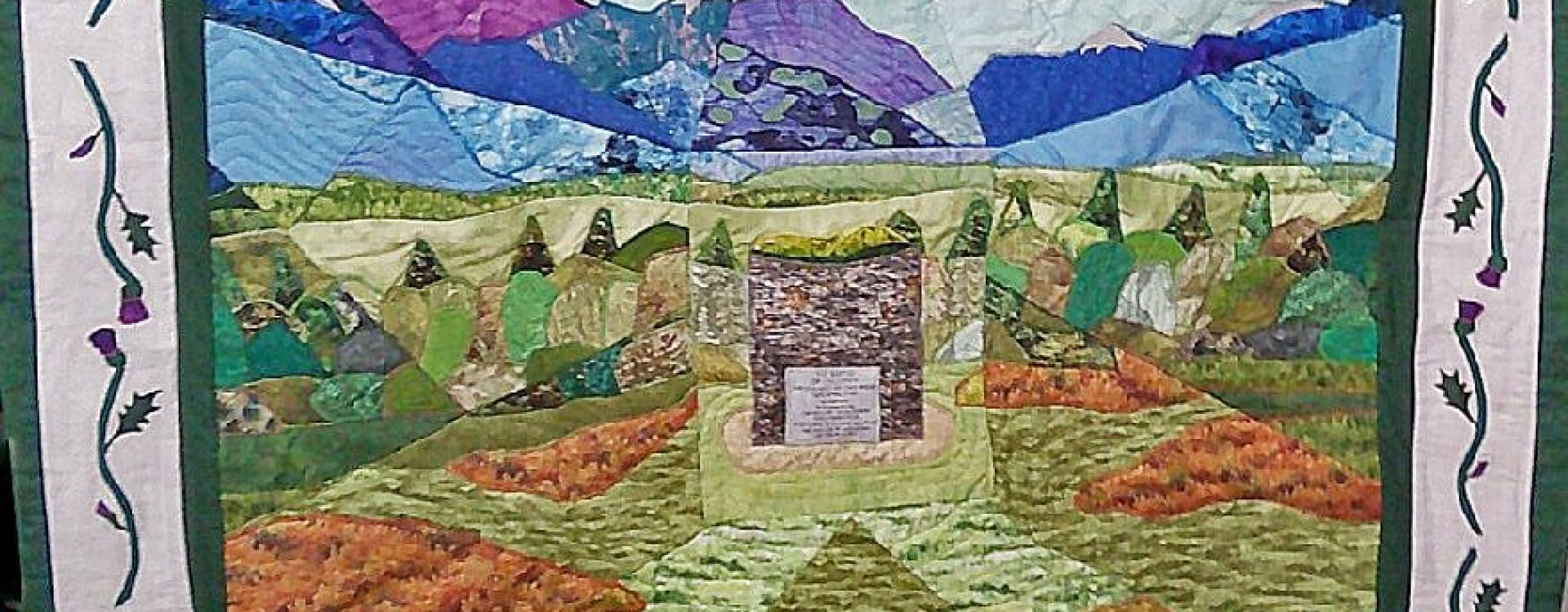 A quilt of the Memorial Cairn at the battlefield of Culloden and the surrounding moorland