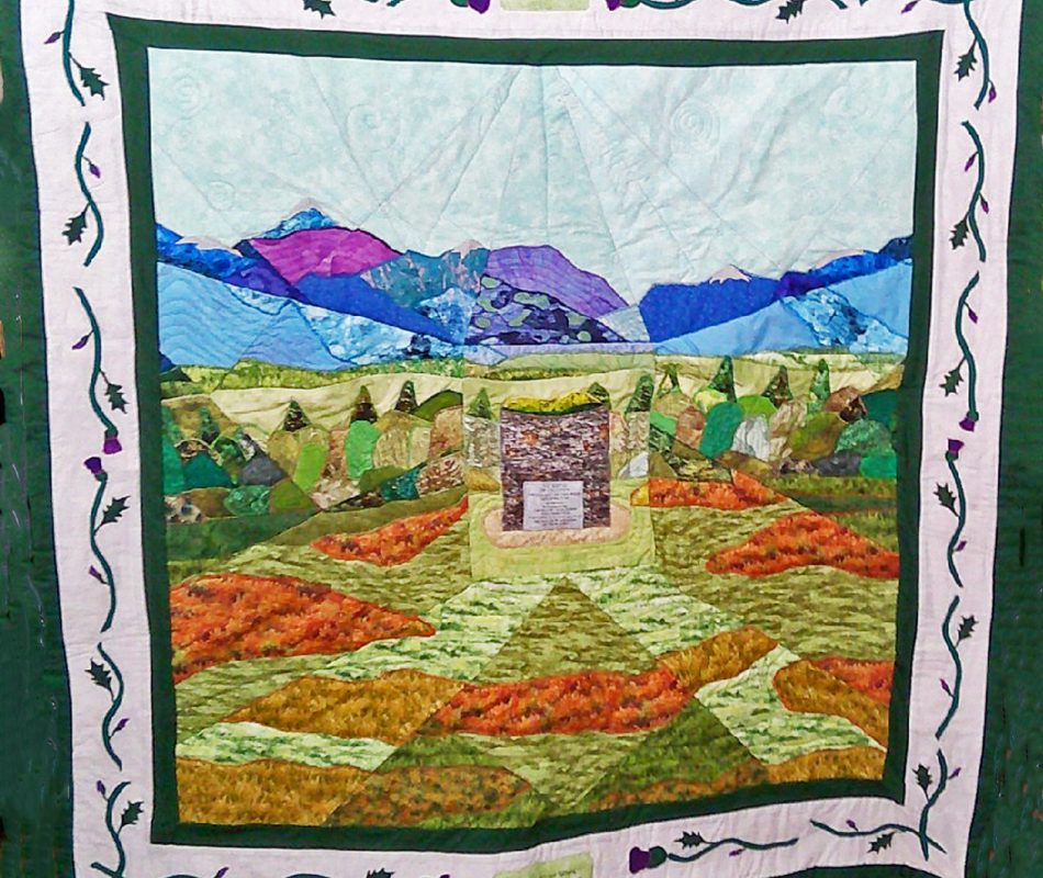 Quilt depicting the Memorial Cairn on the battlefield of Culloden