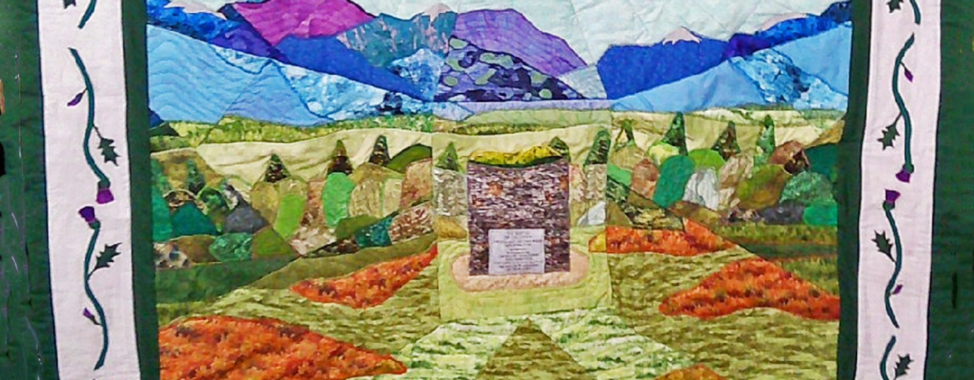 Quilt depicting the Memorial Cairn on the battlefield of Culloden