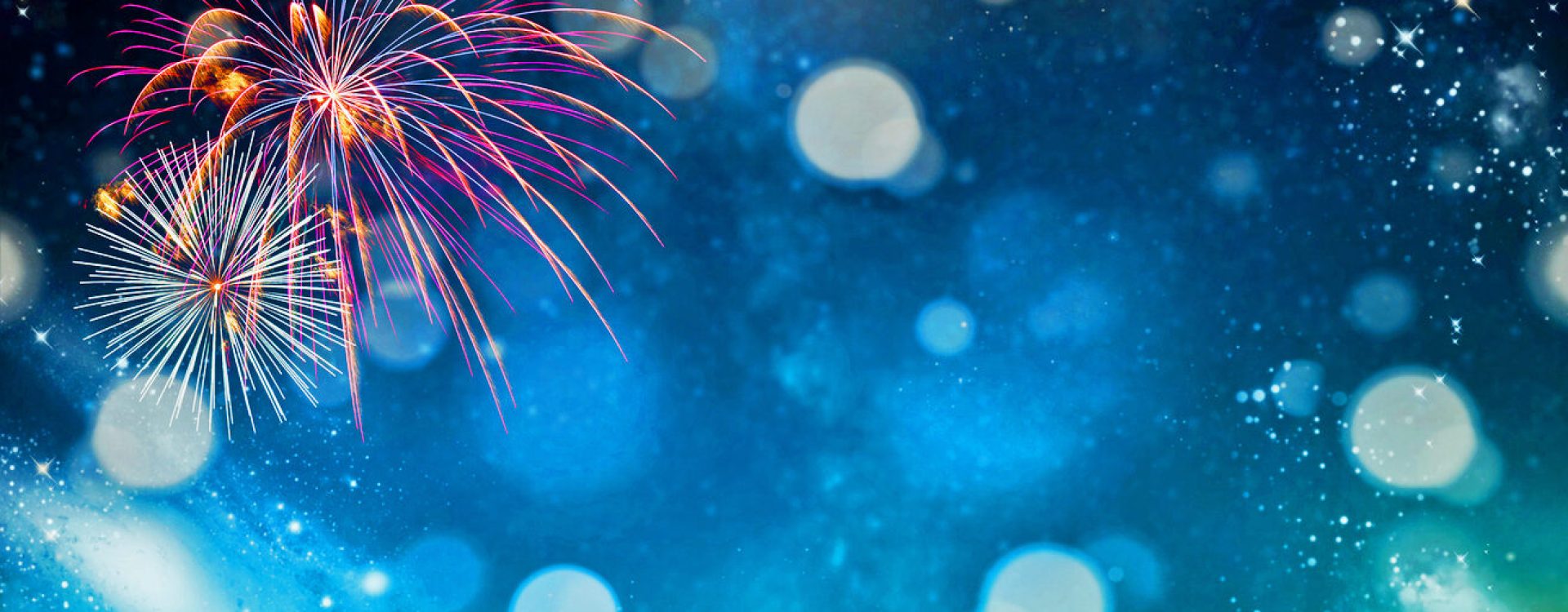 Fireworks at New Year and copy space - abstract holiday background