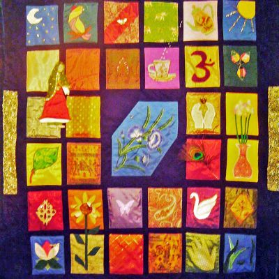 A tapestry-like quilt depicting the spirit of India