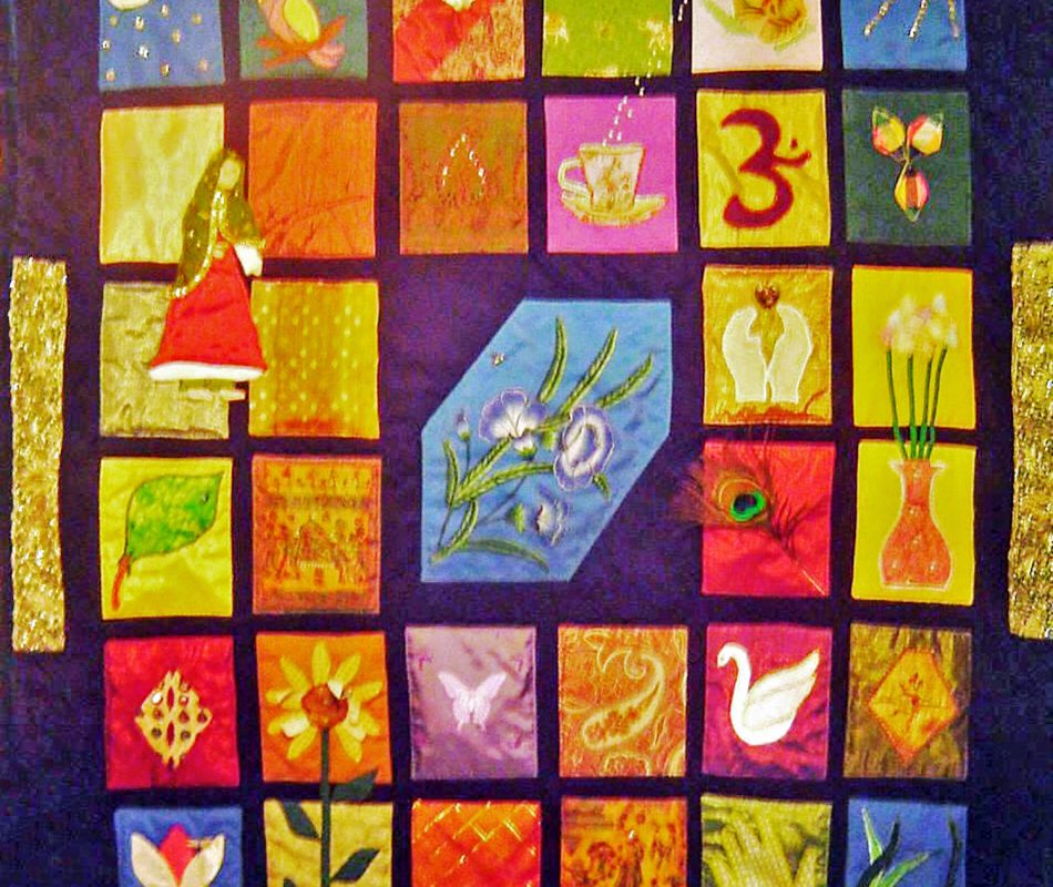 A tapestry-like quilt depicting the spirit of India